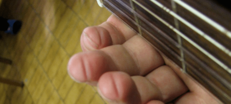 Les doigts d'un guitariste